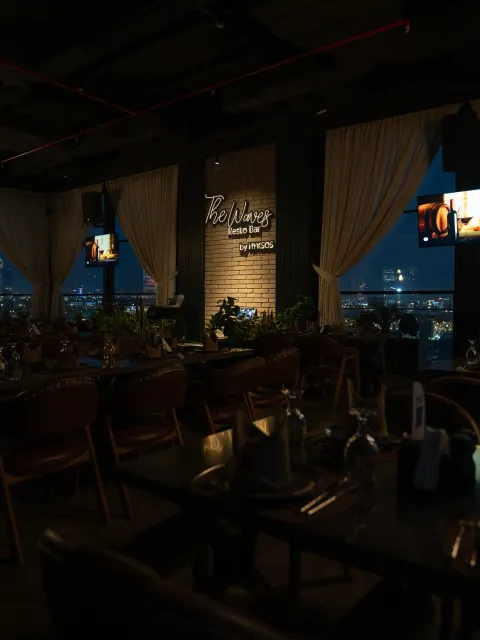 The Waves Rooftop Bar at night with panoramic views over Erbil